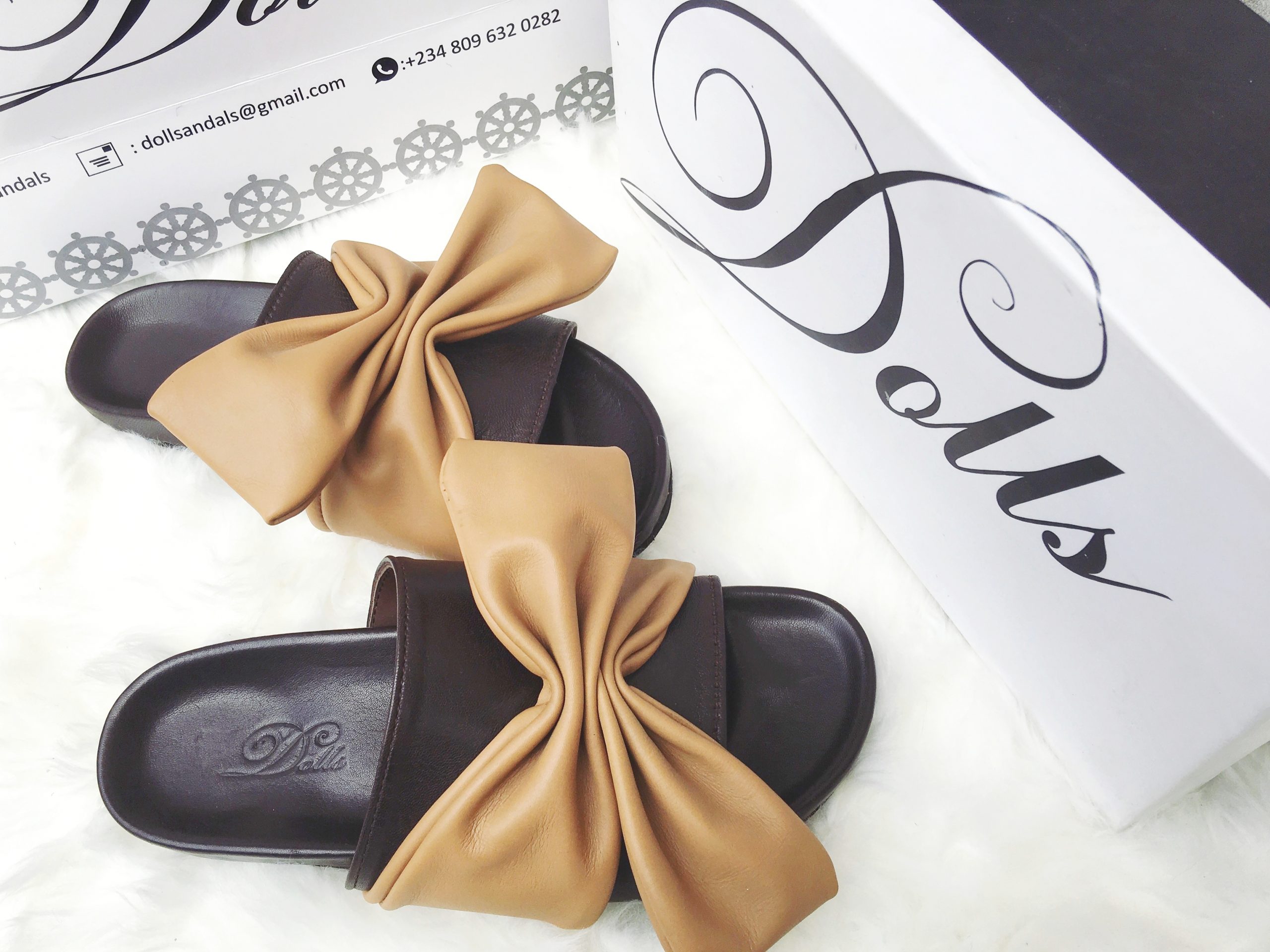 Picture of a pair of slides for women by Dolls leather products