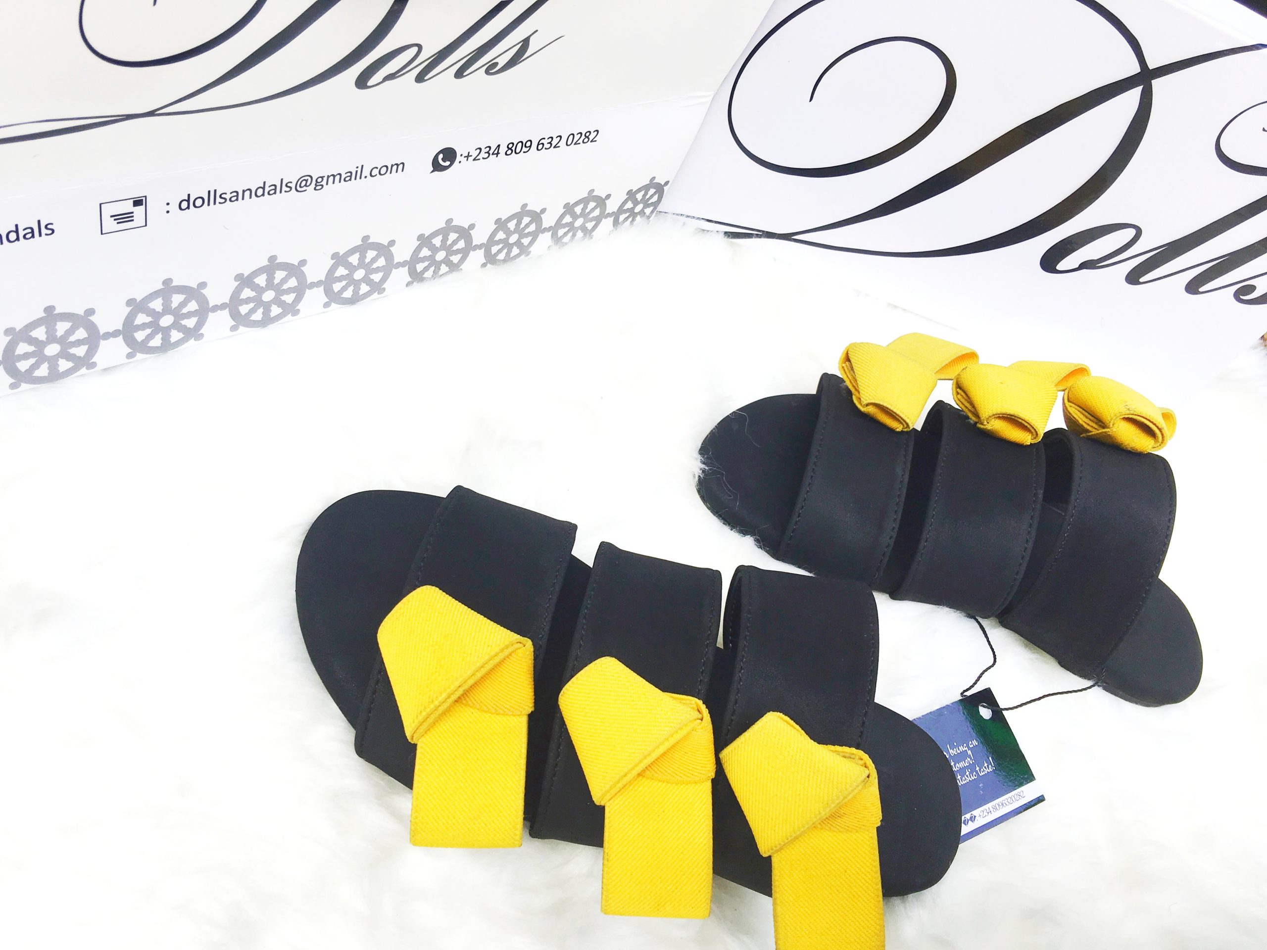 picture of a pair of female slides by Dolls leather products