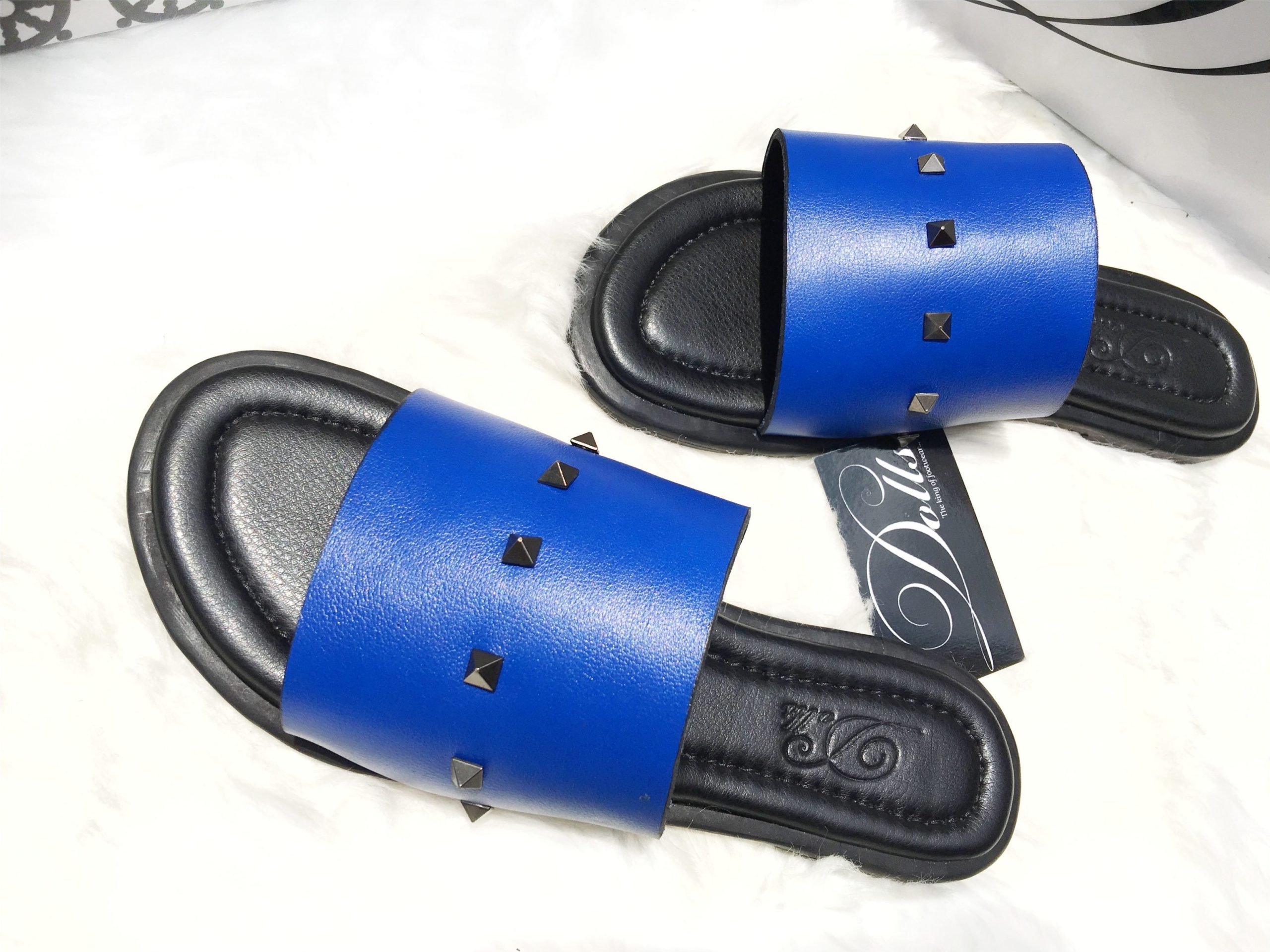 picture of a pair of female slippers by Dolls Leather products