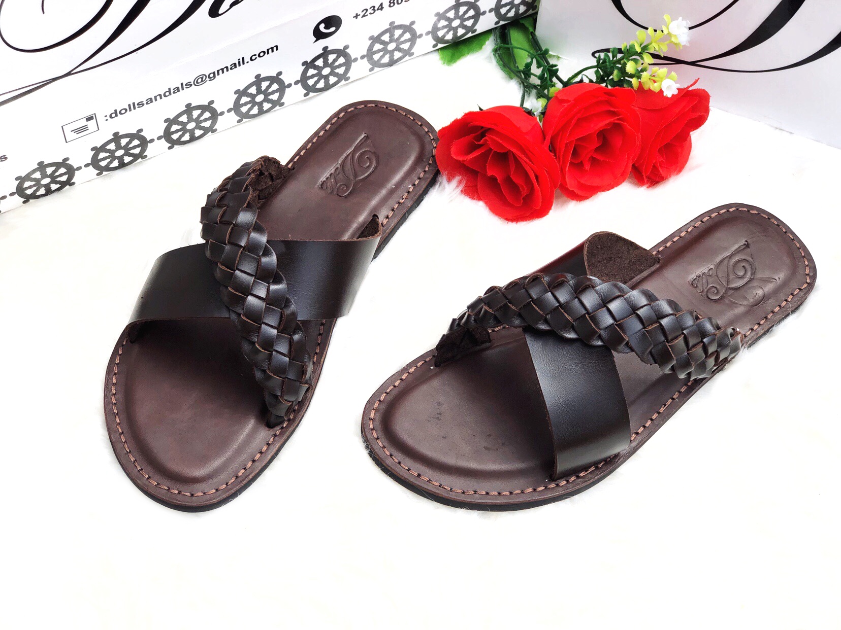 picture of a cross leather slippers for men by Dolls leather products. Oba