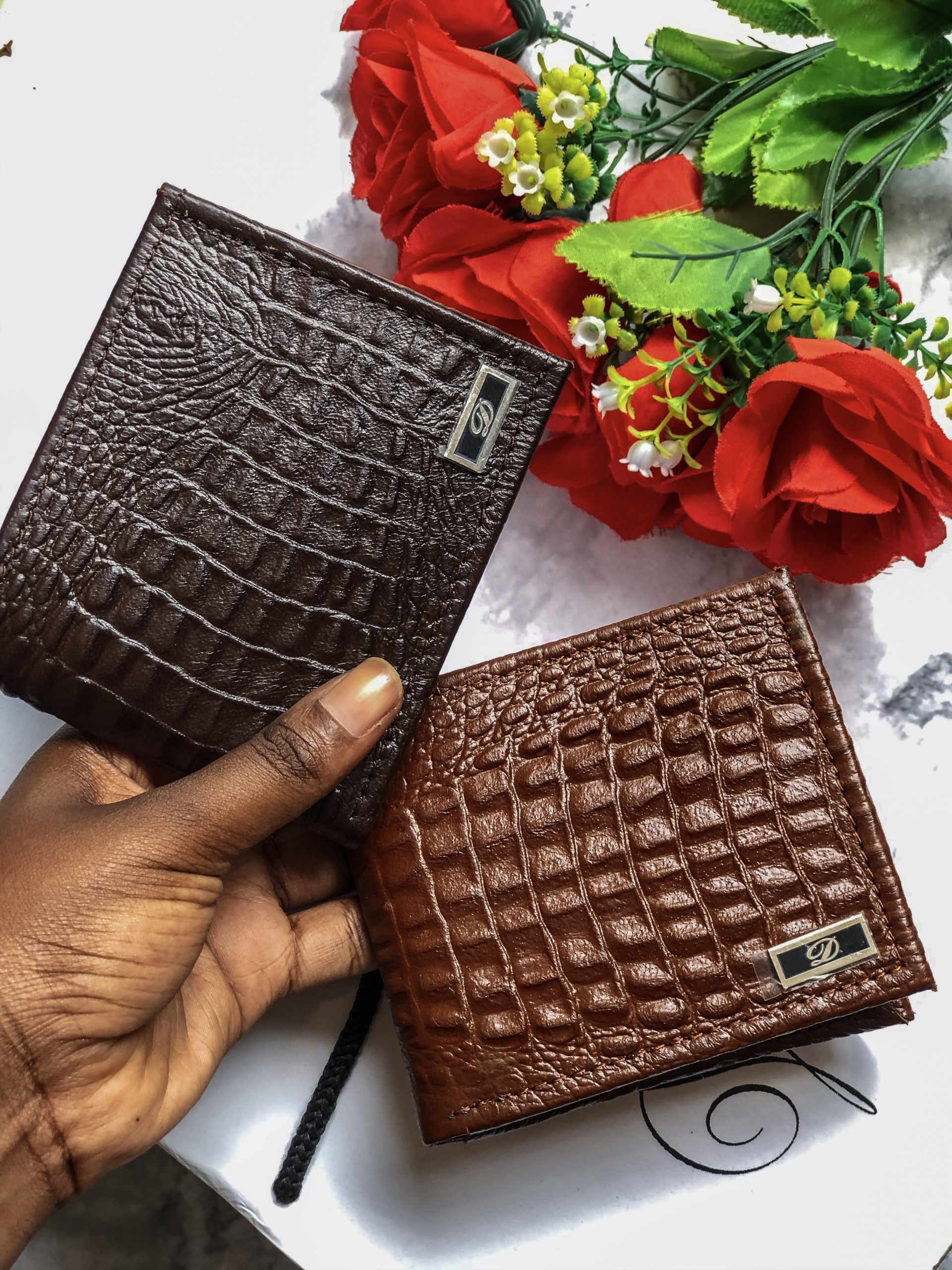 Two croc wallets