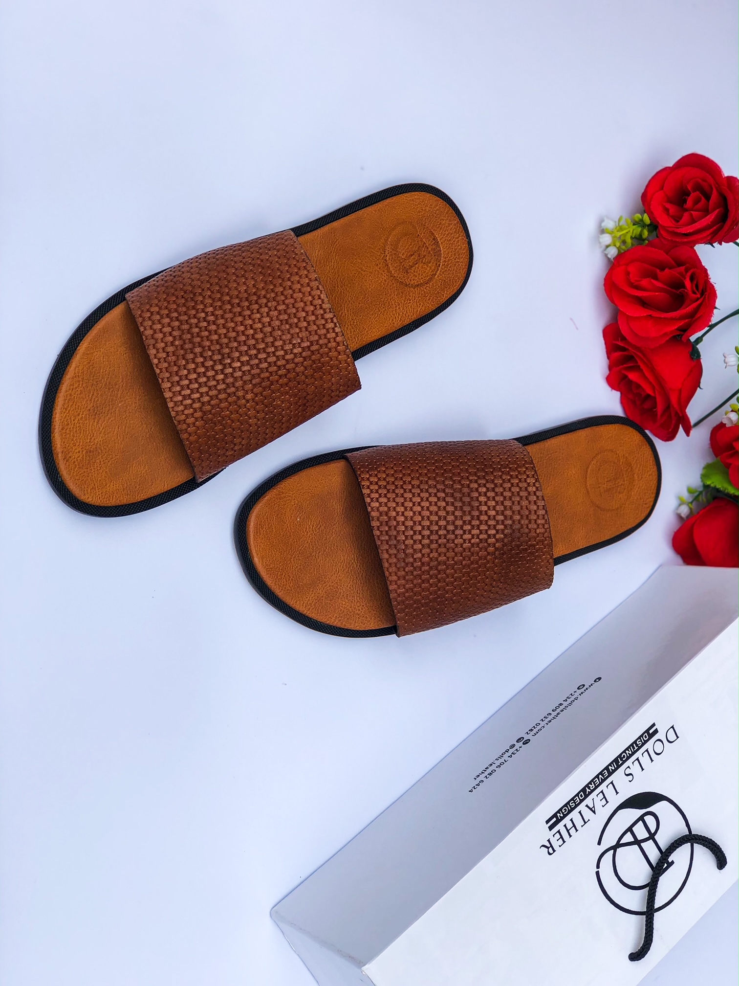brown embossed slippers